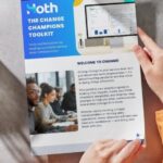Hands holds a mock up of Hoth's Change Mangement Toolkit Front Cover 