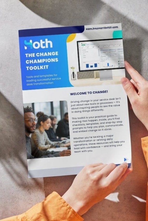 Hands holds a mock up of Hoth's Change Mangement Toolkit Front Cover